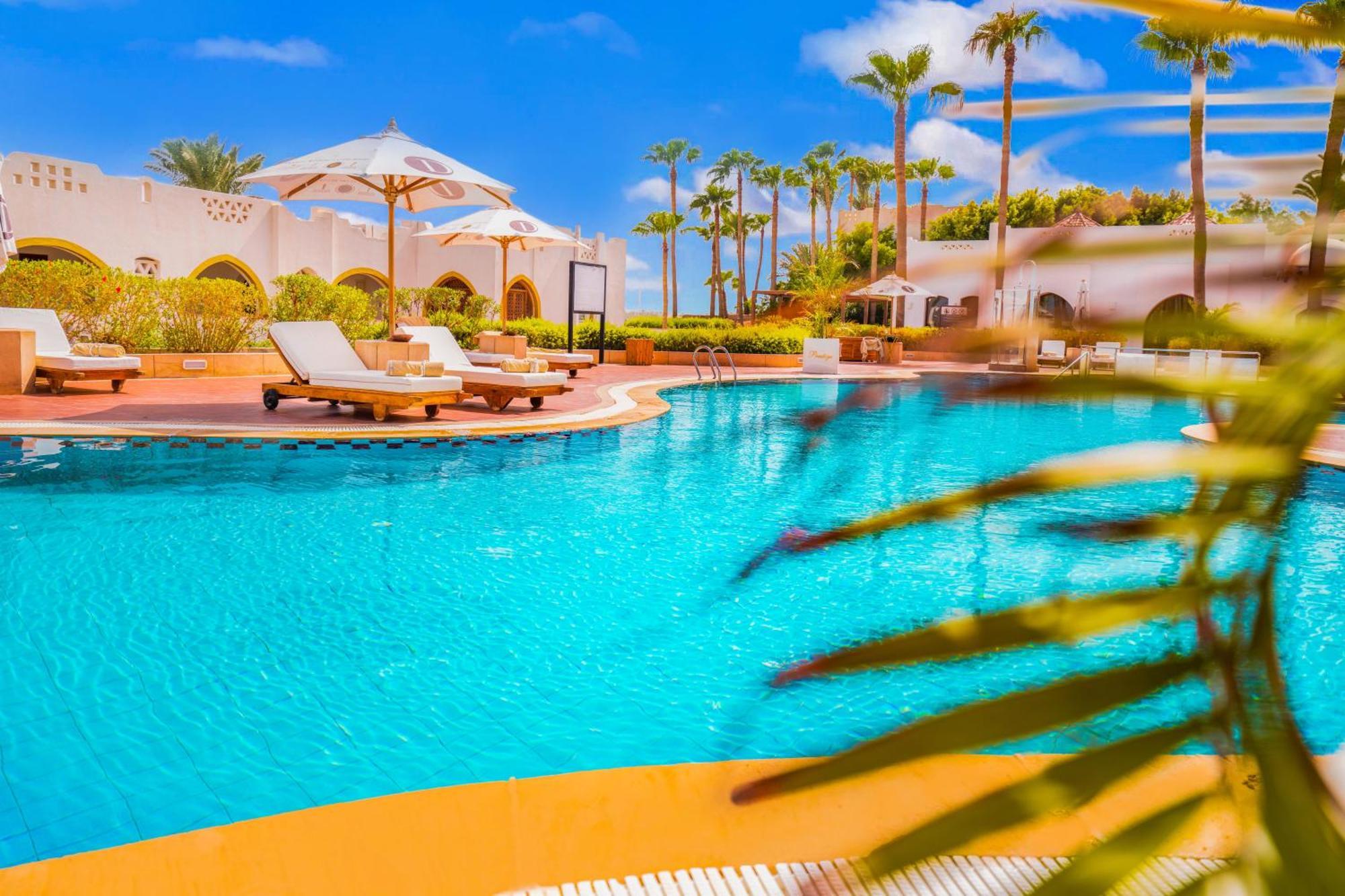 Domina Coral Bay Resort, Diving , Spa & Casino شرم الشيخ المظهر الخارجي الصورة The swimming pool at the resort