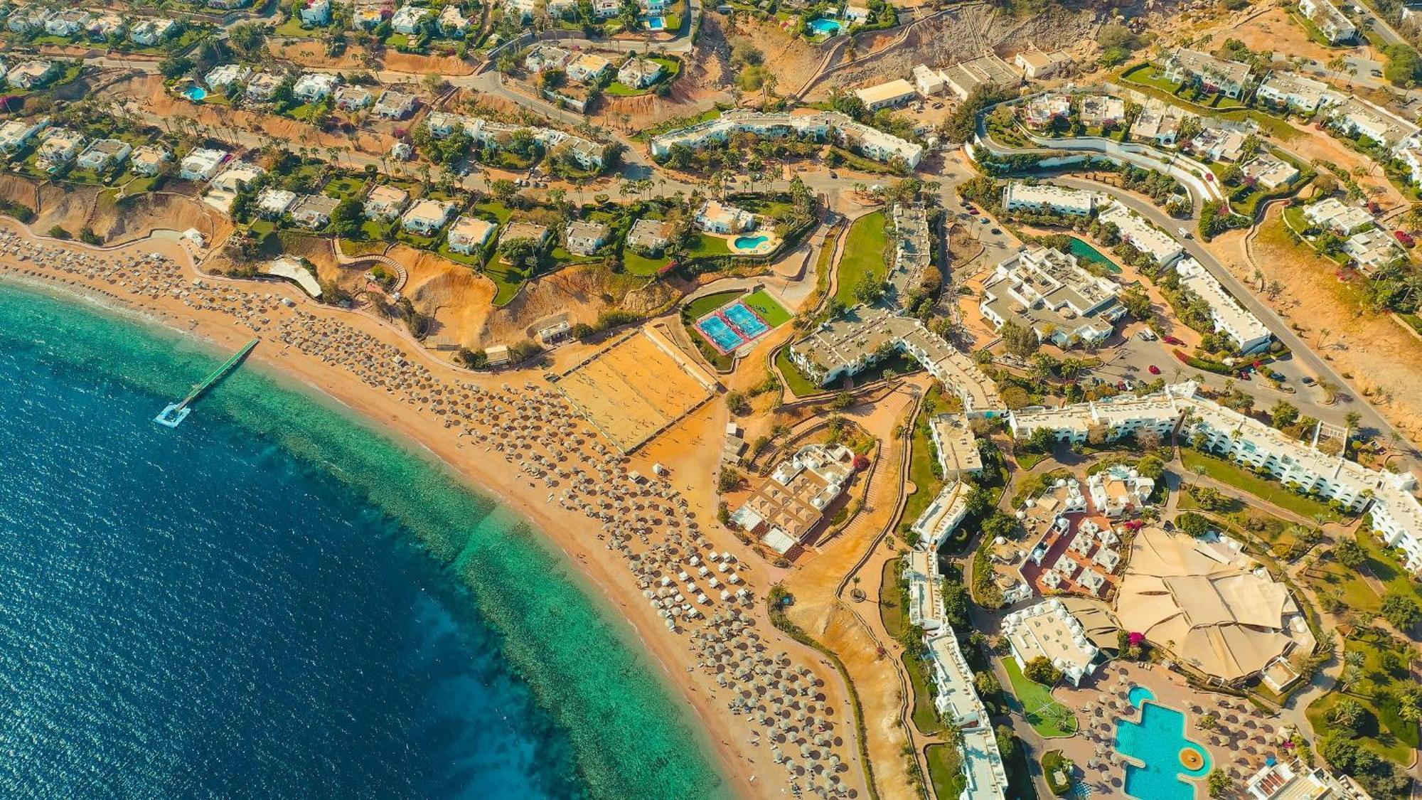 Domina Coral Bay Resort, Diving , Spa & Casino شرم الشيخ المظهر الخارجي الصورة Aerial view of the bay